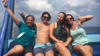 crystaldive.com-peak-performance-buoyancy-buoyancy-course-happy-divers-on-boat