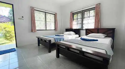 crystaldive.com-bungalow-inside Inside view of a bungalow from Crystal Dive Koh Tao