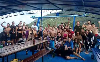 Crystal dive boat full of happy divers on Koh Tao