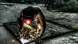 Coral Tribe welding artificial reef structures for Junkyard Reef Koh Tao