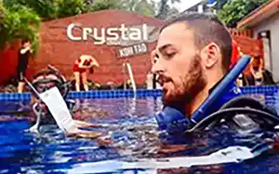 Crystal Dive instructor in the pool teaching