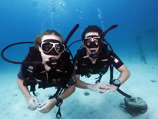 Two Divers Underwater Open Water Diver Course Koh Tao Two divers enjoying the underwater world on Koh Tao