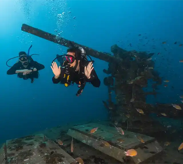 Advanced Adventurer diver from Crystal Dive at HTMS Sattakut wreck on Koh Tao