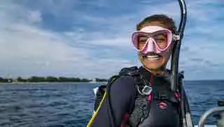 Koh Tao SCUBA diving courses smiling on the boat