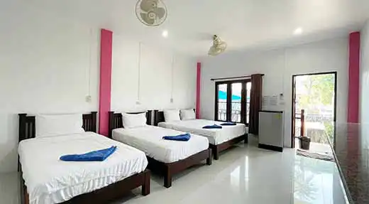 crystaldive.com-pink-bungalow-family-room-inside Regal Resort Hotel family room on Koh Tao