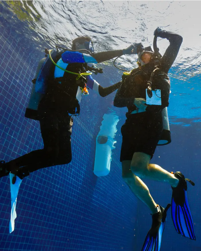 assistant instructor trainer course emergency ascent Assistant Instructor Trainer Course (AIT) candidate performing skill in the Crystal Dive pool