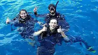 crystaldive.com-divemaster-course-happy-divers-on-surface Crystal Dive happy divemasters on the surface