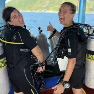 Two girls taking the Enriched Air Nitrox course on the Crystal Dive boat before the dive starts on Koh Tao