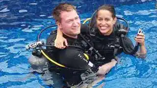 crystaldive.com-scuba-diver-course-divers-swimming-pool-smile Crystal Dive students in the pool smiling