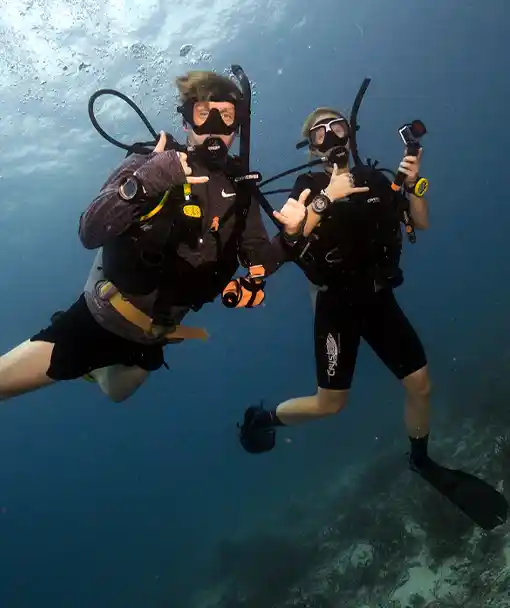 intermediate dive training Thailand divers with photo camera