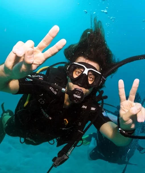 Open Water Course Koh Tao student having fun on the first dives