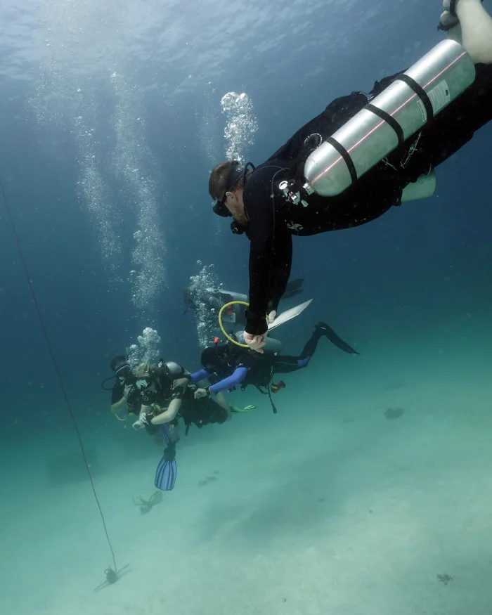 assistant instructor trainer course candidate evaluating in the ocean