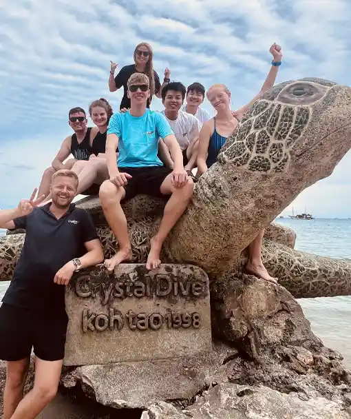 Trainees celebrating their divemaster course koh tao