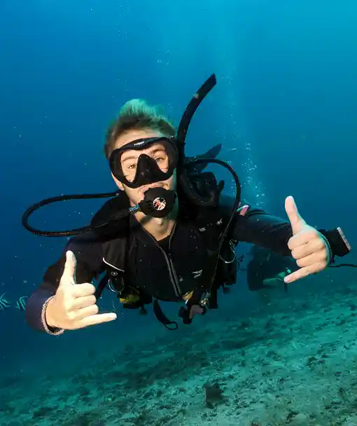 Happy diver on shark ecology course Koh Tao