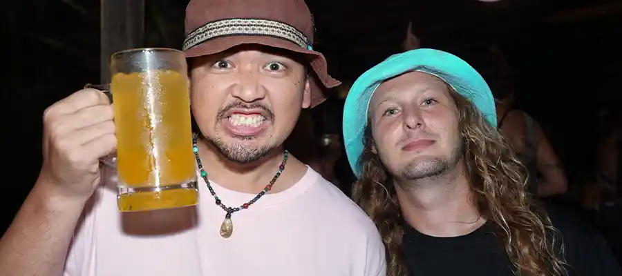 Divemasters celebrating with a cold drink