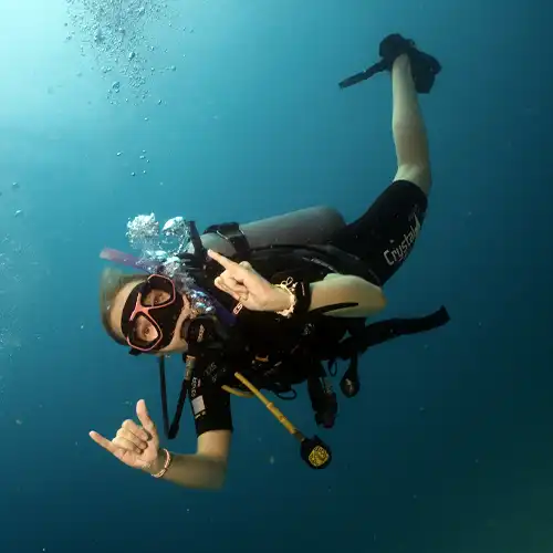 A happy diver with the awesome sign
