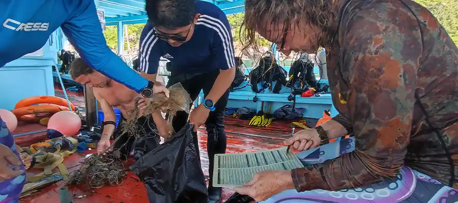 Coral Tribe researching dive debris