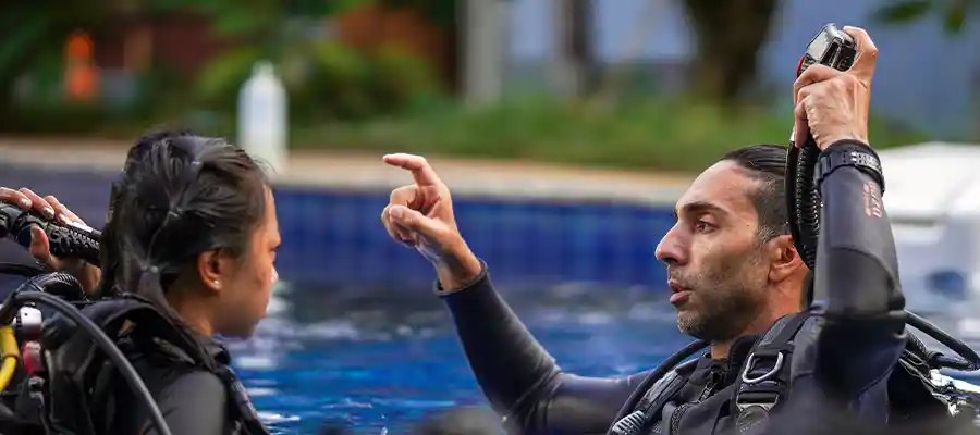 Diver learning in a pool