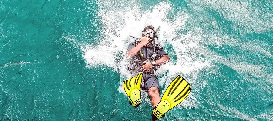 Scuba Diver entering the water