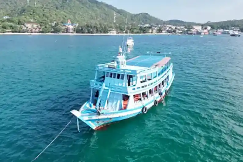 Crystal boat in the water at the Best time to dive Koh tao