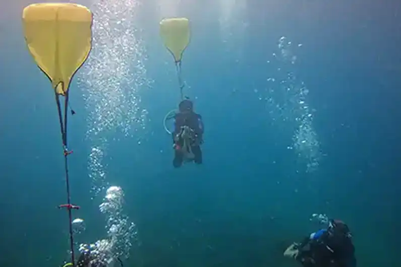 Crystal Dive Search and Recovery Specialty divers practicing lift bag use on Koh Tao