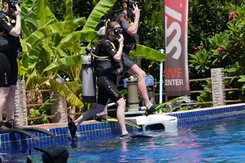 Crystal Dive Open Water Students Doing Giant Stride In To Big Pool Koh Tao Thailand