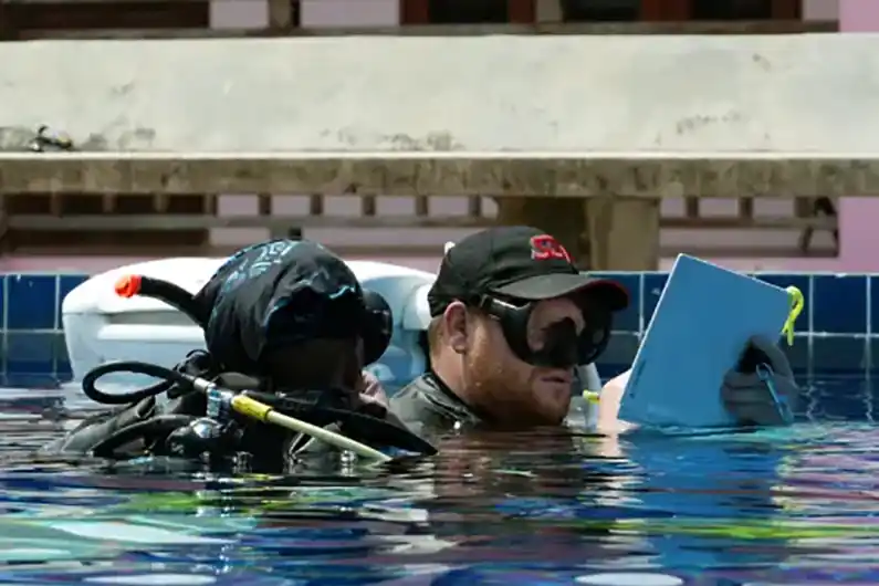 Instructor Course candidate getting evaluated by SSI Instructor Trainer in Crystal Dive pool