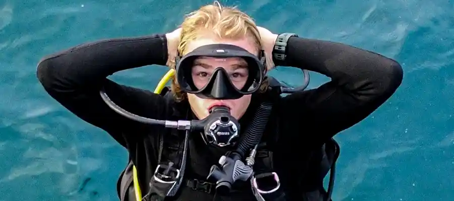 Jump in to the ocean to scuba dive